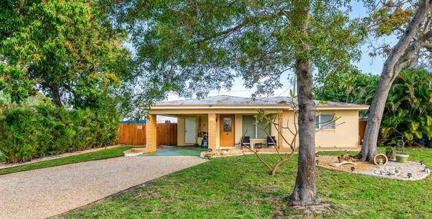 Located in the Garden Acres neighborhood, this outstanding home is nestled on a large corner lot with recently installed privacy fence and new salt water pool.