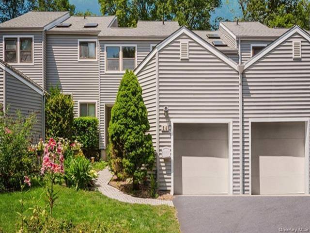 Welcome to 14 Bridle Path Road, a condominium with incredible potential in Ossining's sought after Fox Hill complex.