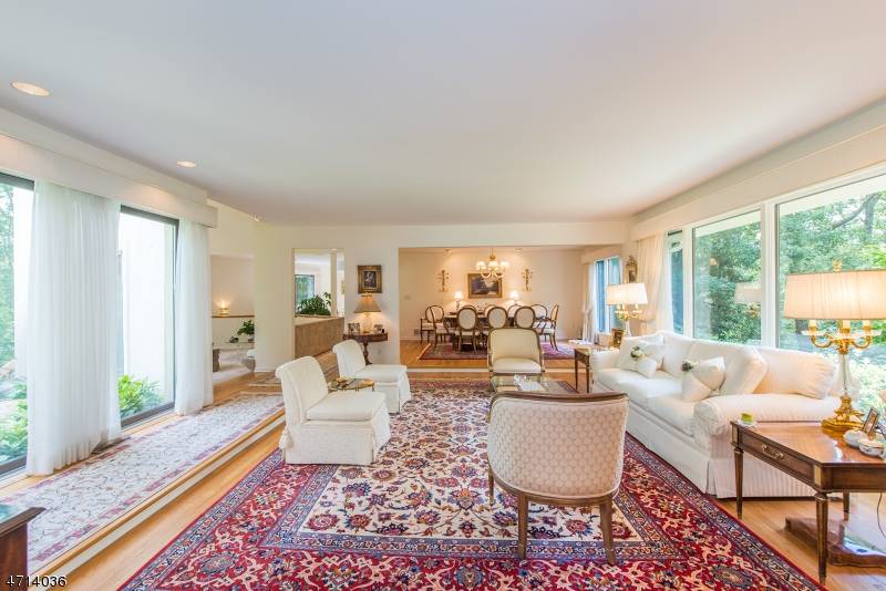 This elegant custom home nestled in complete privacy on 3.