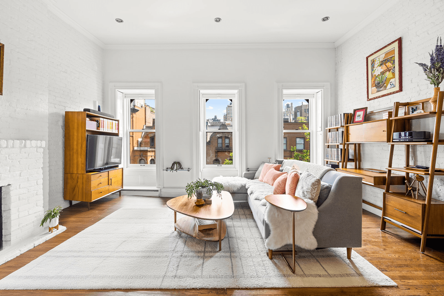A massive private roof deck with gorgeous city views, central air conditioning, a stacked washer dryer and a bonus home office are just some highlights of this beautiful top floor ...