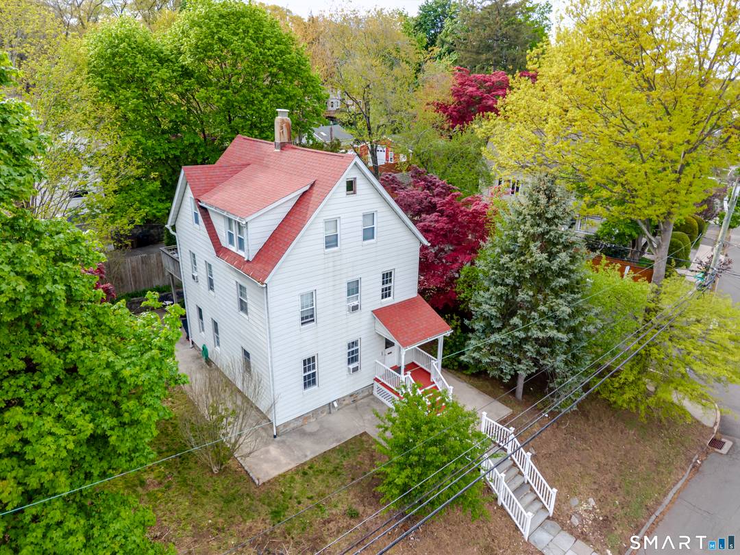 Welcome to 192 Knickerbocker, a beautifully maintained 3 family home nestled on a prime lot in Stamford's desirable Springdale neighborhood.