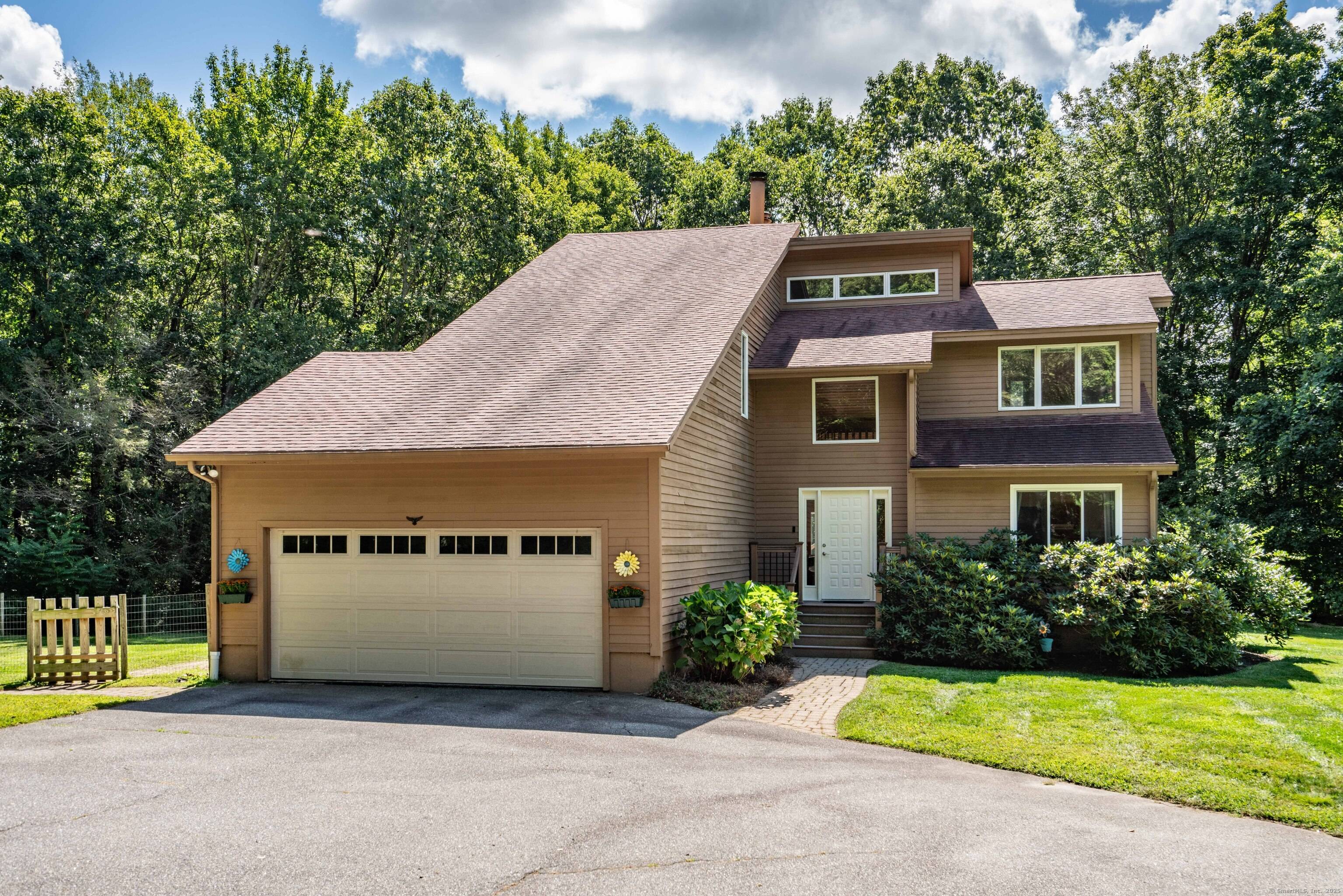 Impeccably maintained 4 bed 3 full bath Contemporary home on over 5 acres of land with an abundance of natural light throughout the home.