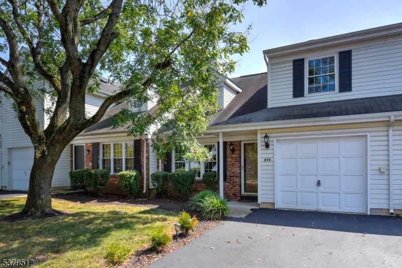 This bright and beautifully updated home offers a spacious open floor plan with soaring ceilings and a cozy wood burning fireplace ?