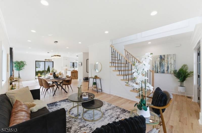 This thoughtfully designed residence sits atop an existing foundation and offers a seamless blend of modern comforts and practical luxury.