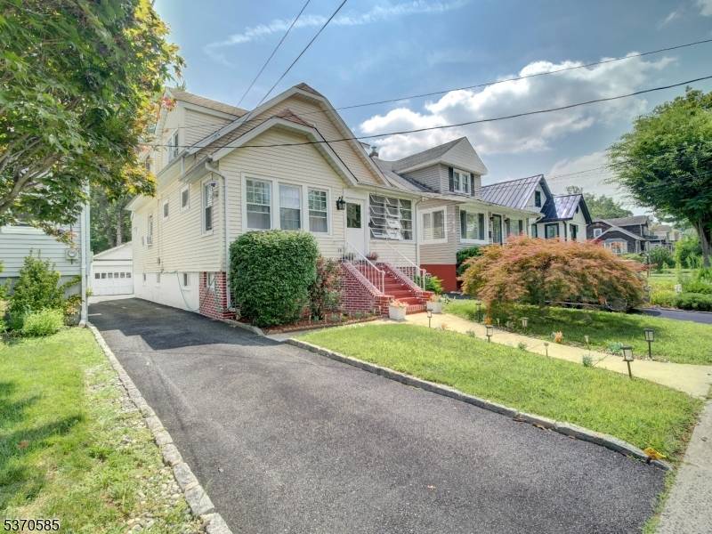 Lovely Colonial featuring inlaid hardwood floors throughout.