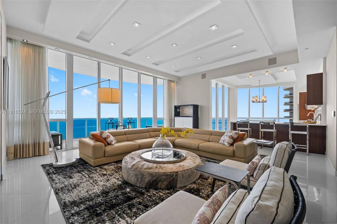 Experience breathtaking ocean, Intracoastal, and skyline views from this stunning 40th floor corner residence at Trump Tower I.