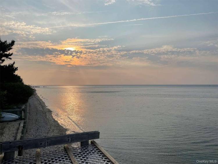 Experience waterfront living at its finest in this beautifully furnished 4 bedroom, 1.