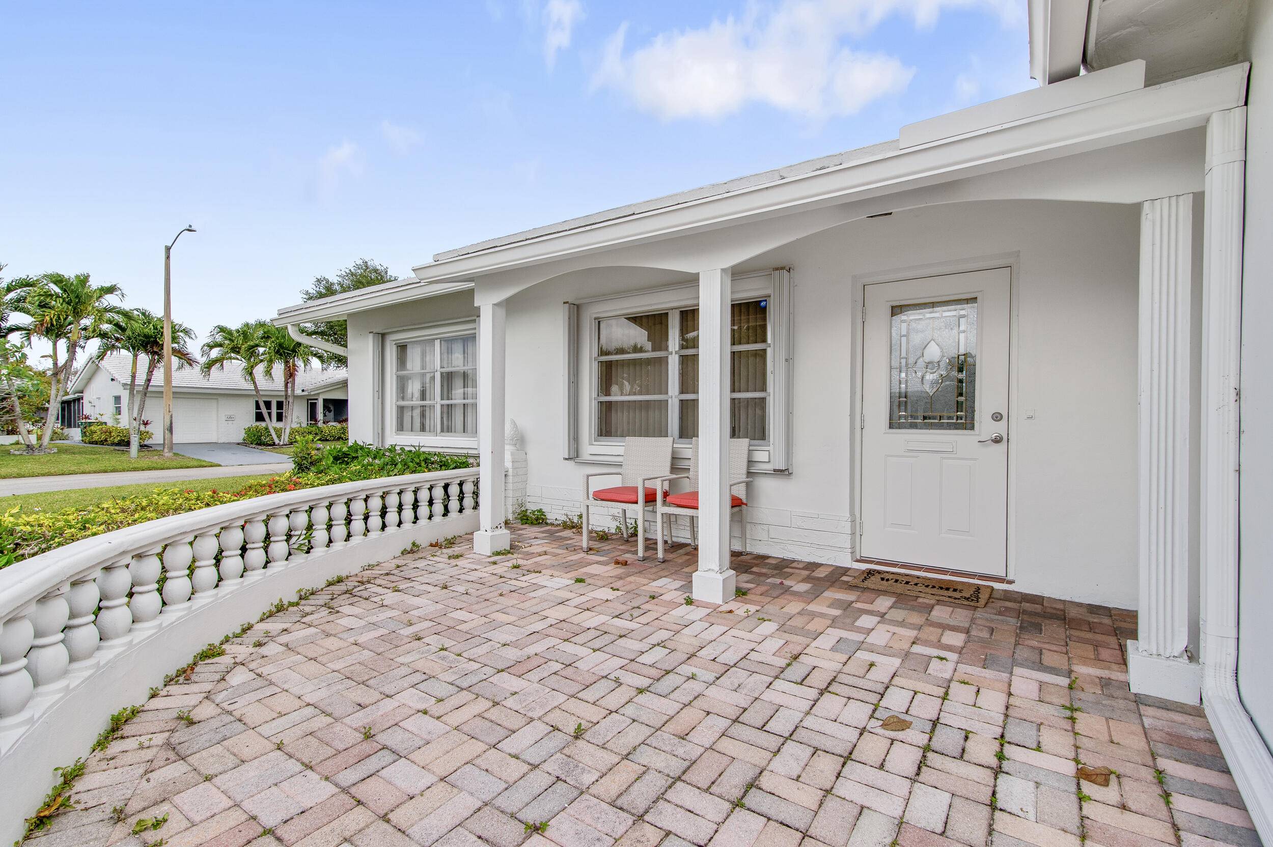 This charming 2 bedroom, 2 bath home, located on a corner lot, features a garage and an inside laundry room.