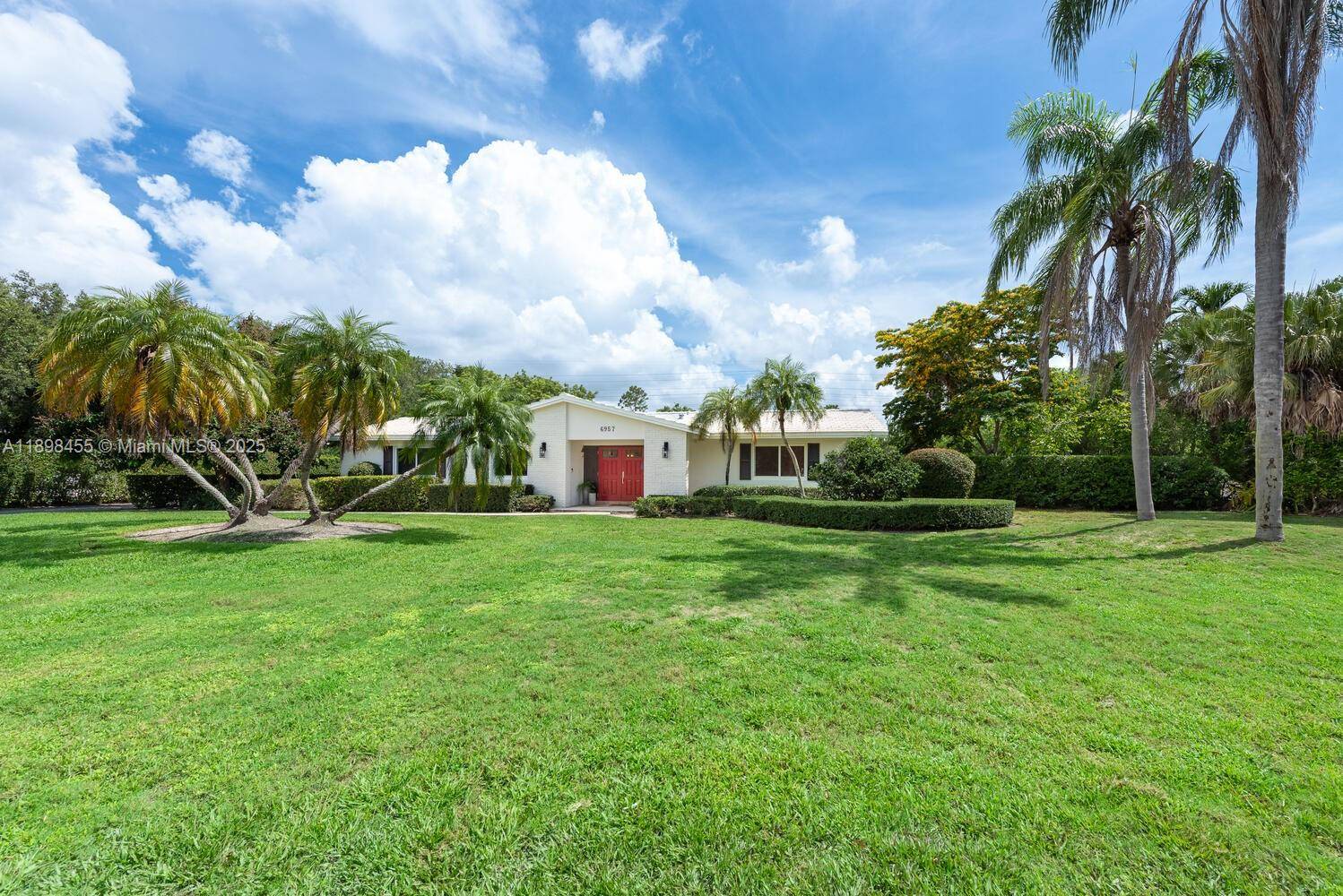 Easy to reach yet hard to find, a wonderful family home awaits in Palmetto Bay.