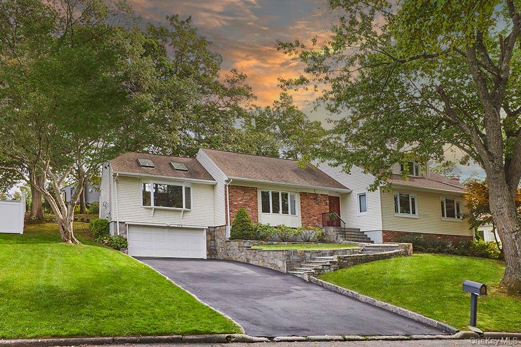 Imagine coming home to leafy Bonnie Crest, where this sun splashed, modern nine room residence at 179 Van Etten Boulevard blends timeless design with easy, everyday comfort.