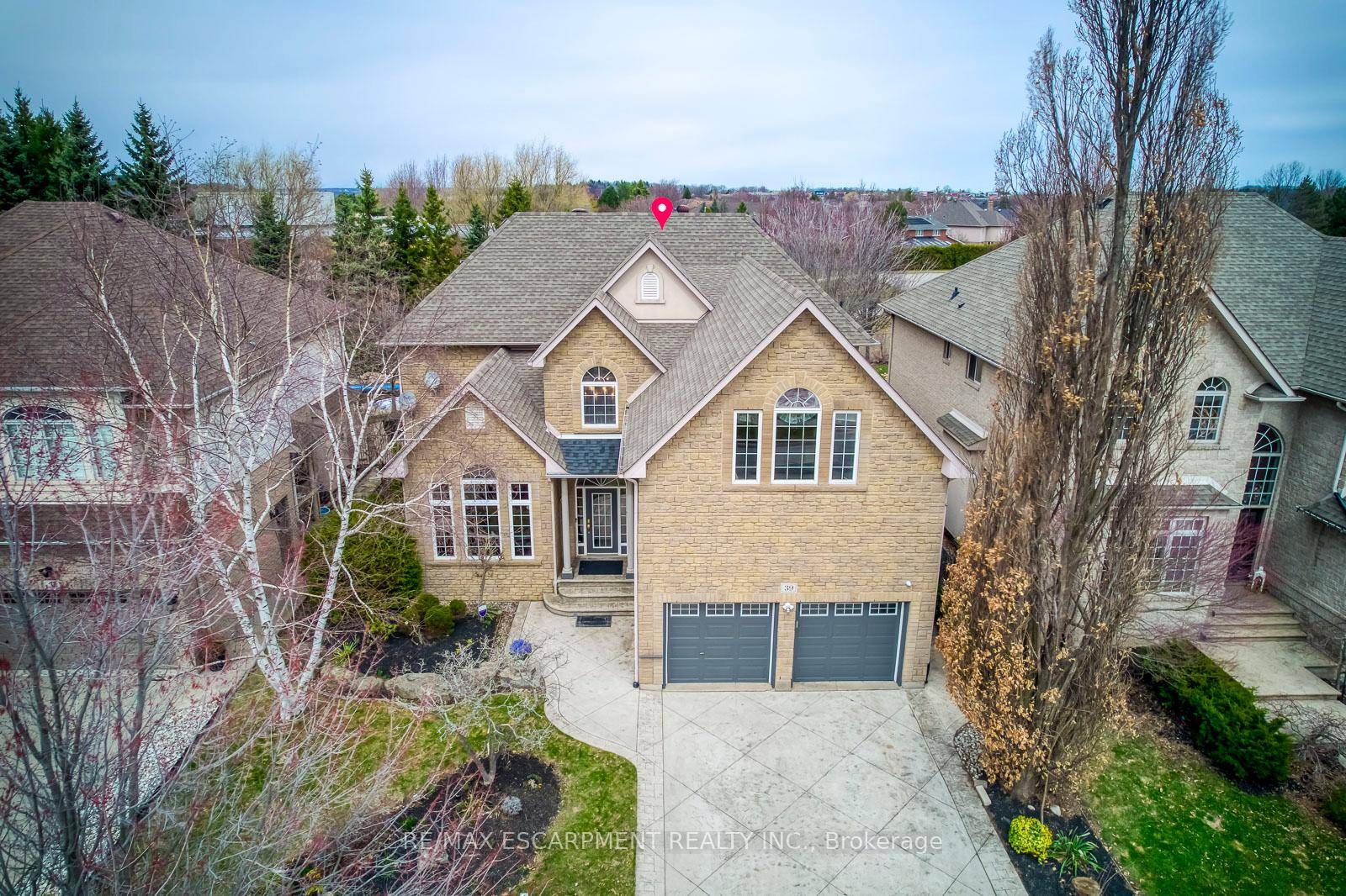 Welcome to 39 Thoroughbred Blvd a custom built luxury estate in Acaster's prestigious Meadowlands community, backing onto greenspace for rare privacy and serenity.