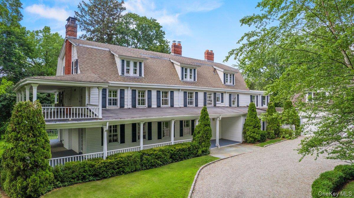 Step into a fairytale at this storybook Harrison residence, where historic charm, unmatched privacy, and prime location come together in perfect harmony !