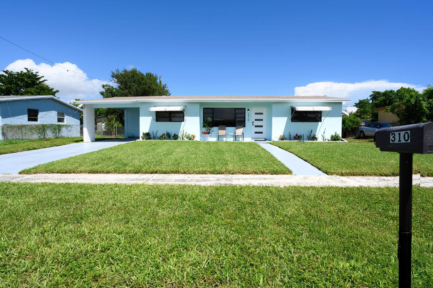 Move in ready, newly renovated modern home with carport and laundry room with storage.