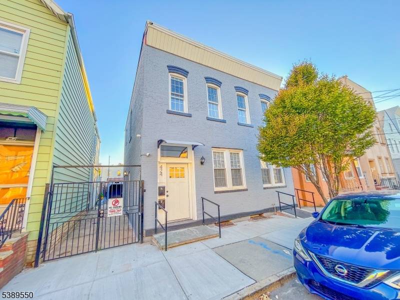 Experience the perfect blend of sophistication, comfort, and convenience with this exquisitely renovated multi family residence, ideally situated in the highly sought after Ironbound section of Newark.