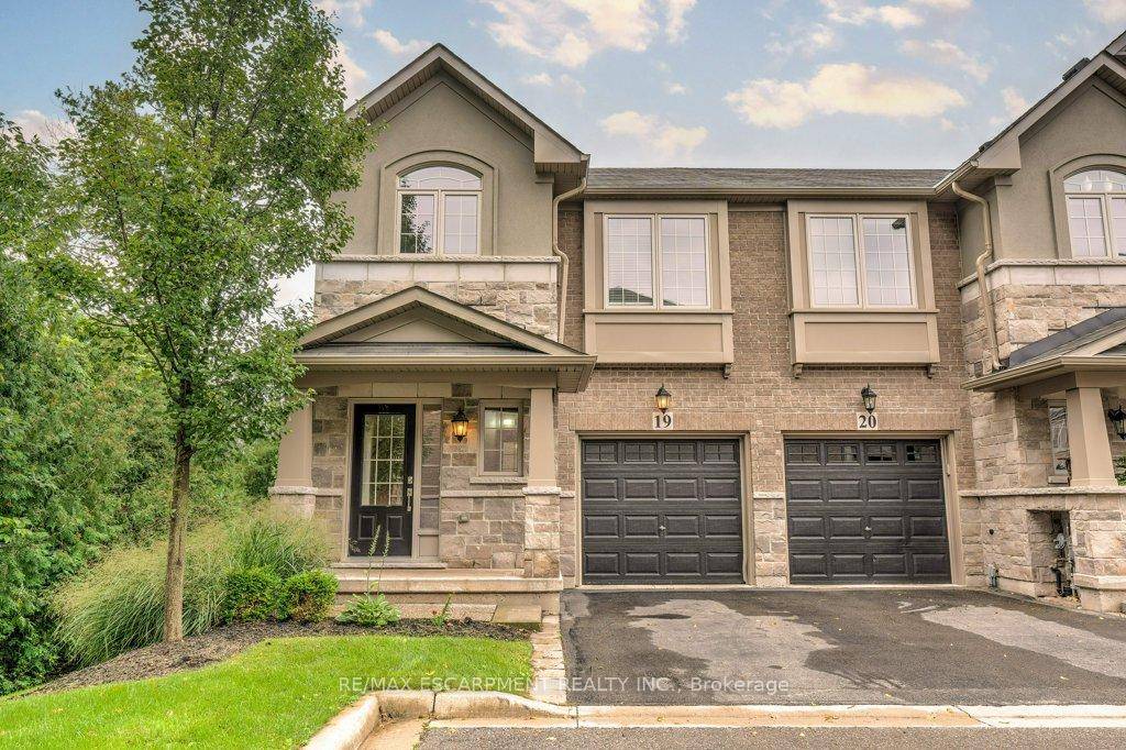 Incredible Location ! ! Rarely offered Executive End Unit Branthaven Townhome with a Premium dead end ravine location in D.