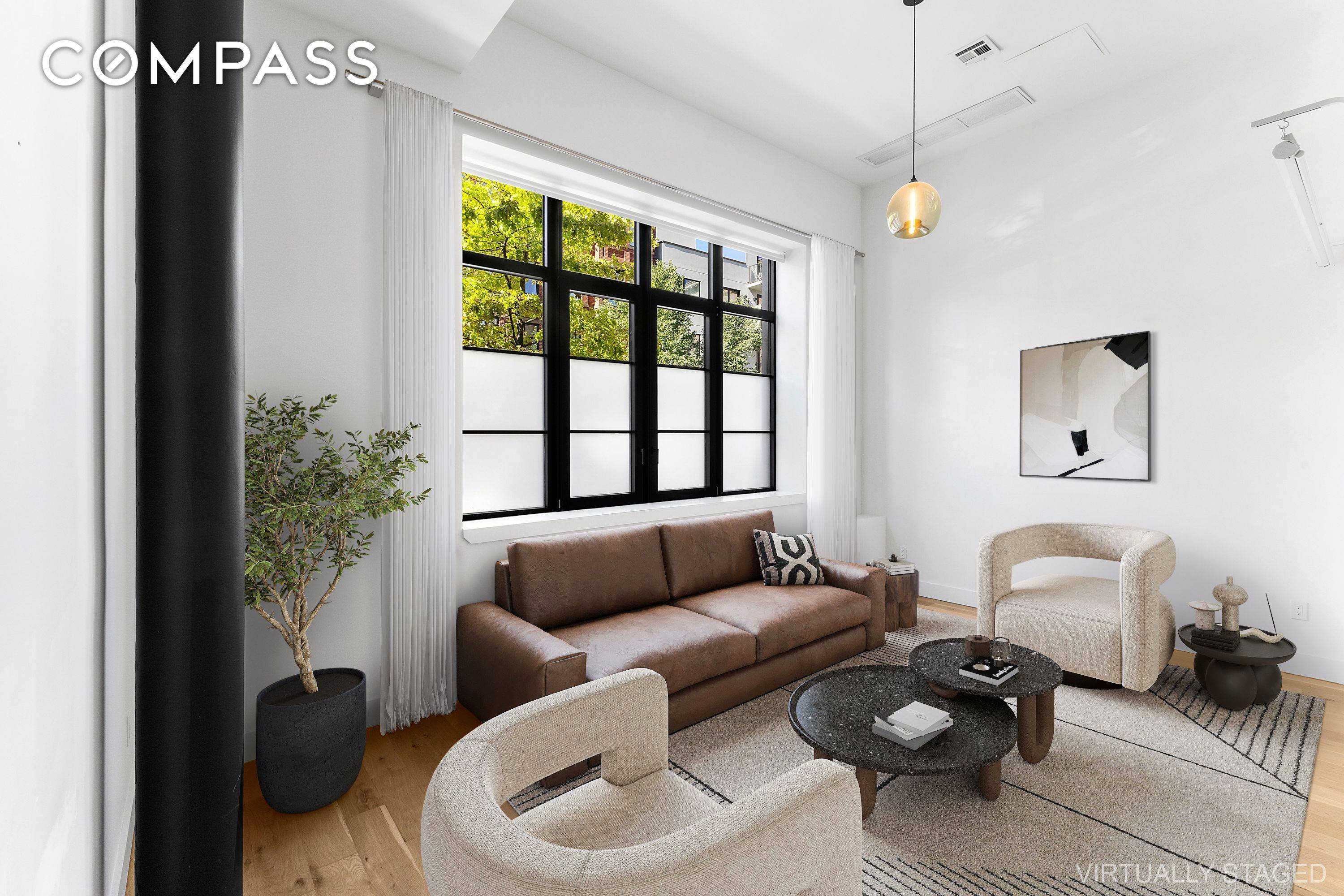 This 14 foot ceiling loft is now offered at 935, 000.