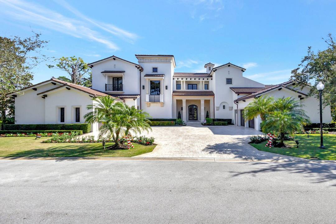 Enjoy the elegance of this custom, over 9, 000 square ft estate located in the exclusive Bears Club in Palm Beach Gardens.