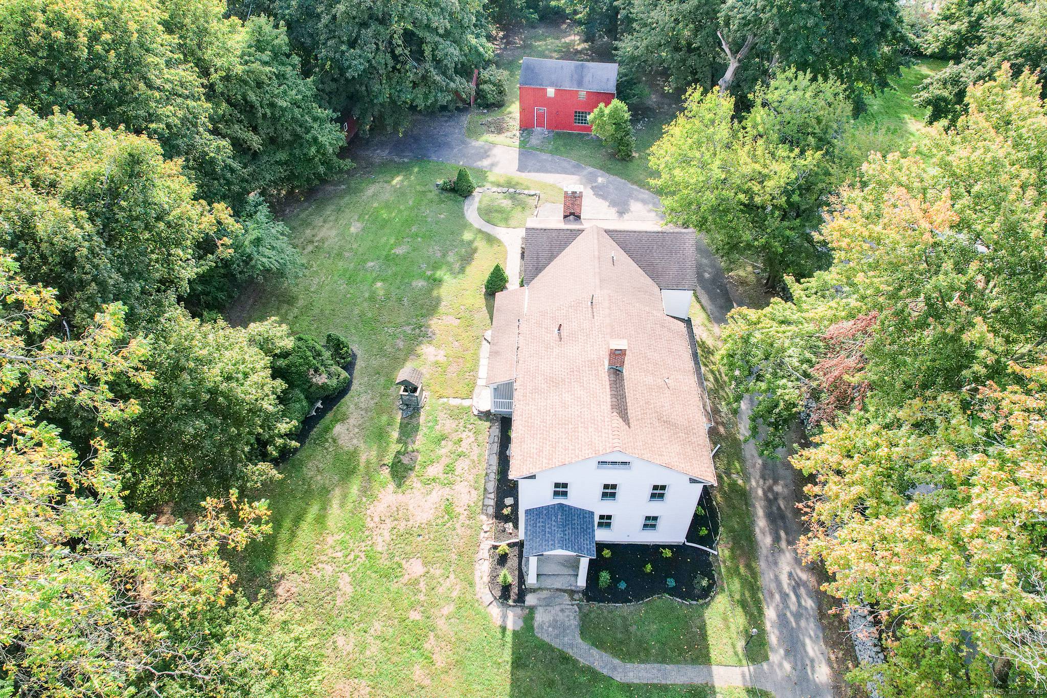 Exquisite Fully Updated Stately Colonial set on a manicured level lot, this distinguished Colonial blends timeless elegance with modern updates.