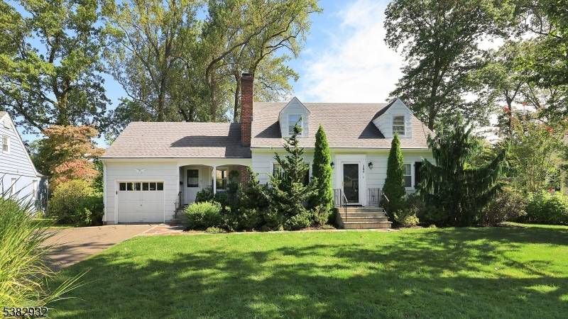 Nestled in one of the most beautiful tree lined streets in Mountainside, this cape cod features all the amenities you could wish for !