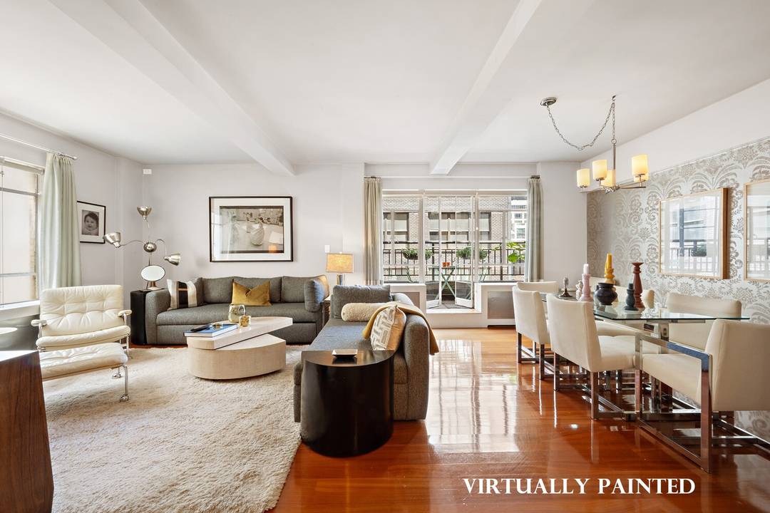 With its location at the very center of Manhattan across from the Museum of Modern Art, and at the cross roads of the Entertainment, Finance and Commerce worlds, this very ...
