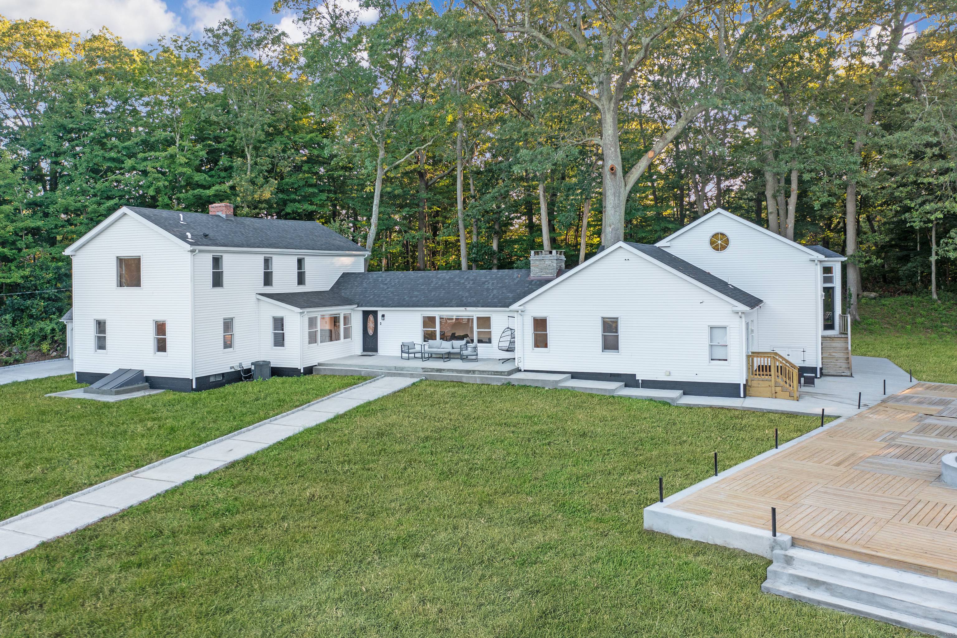This fully renovated and expanded Farmhouse Colonial offers nearly 4, 000 sq ft of luxurious living space on a private 1.