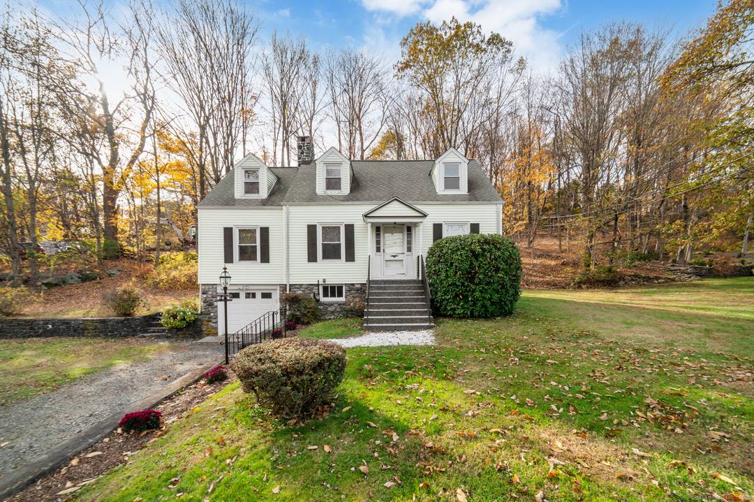 Welcome to 46 South King Street, a charming Cape style home full of character and original mid century details.