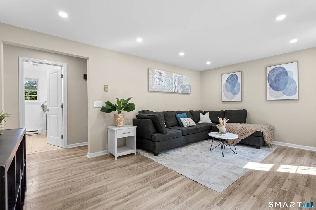 Cape style home offering 4 bedroom, 1 full 2 half baths plus finished basement large yard !