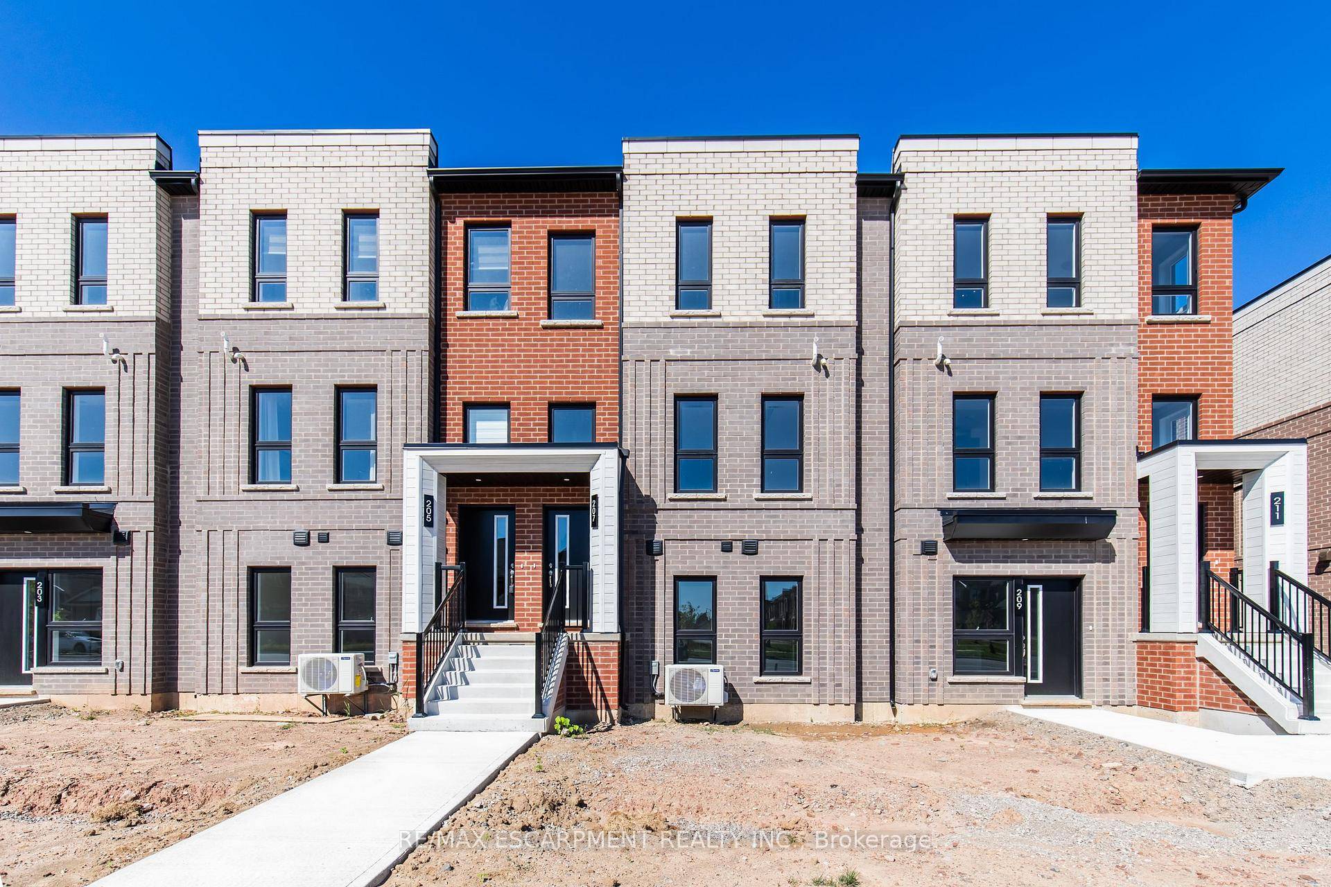 Stunning brand new, never lived in stacked townhome by award winning New Horizon Development Group.