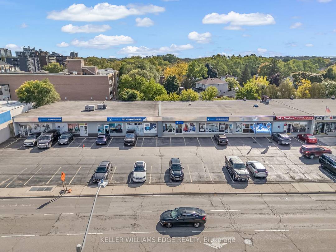 Fully tenanted retail plaza in the heart of Oakville's main commercial corridor.