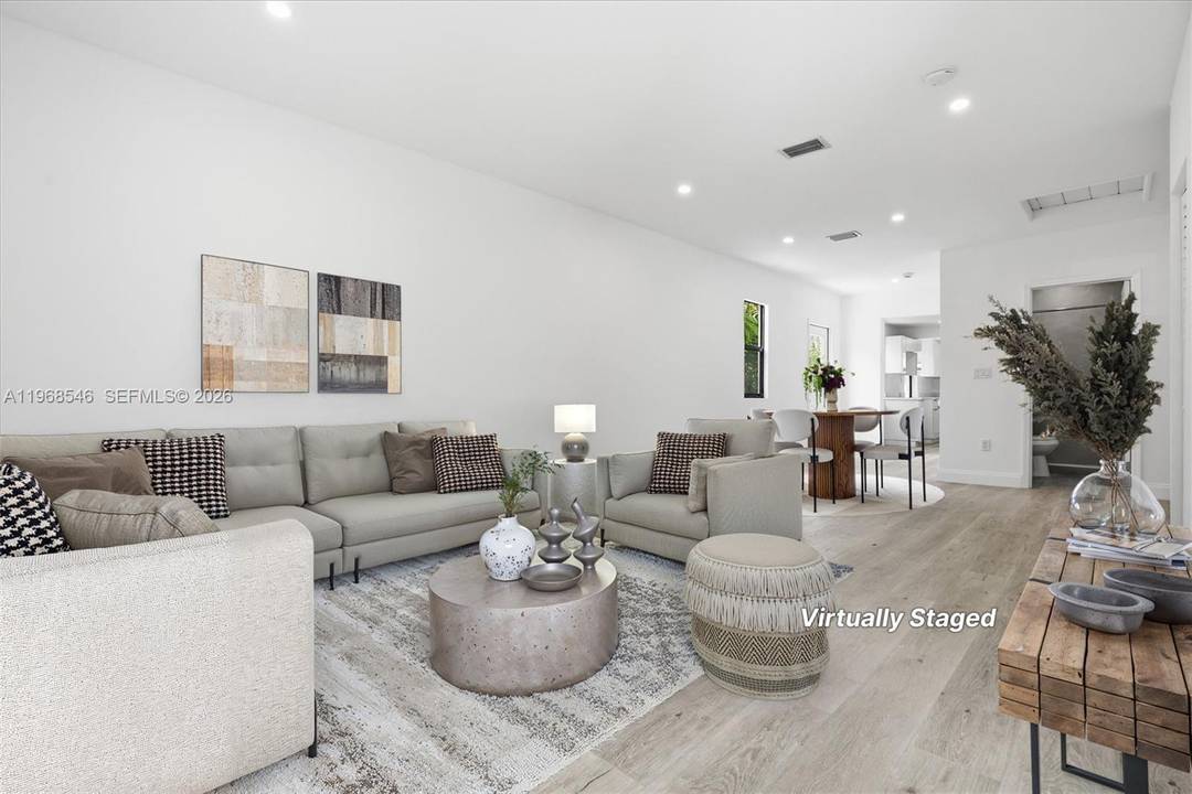 Welcome home to this beautifully renovated gem in the heart of Coral Gables.