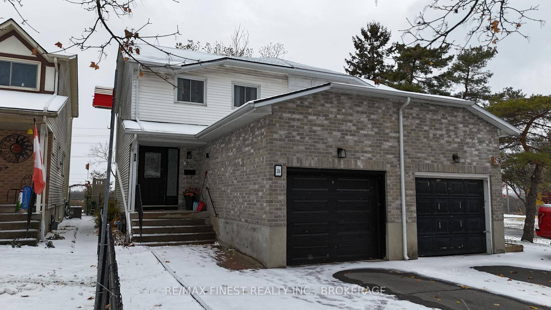 This bright and welcoming home features a modern kitchen with breakfast bar, gleaming hardwood floors throughout, and three spacious bedrooms with 1.