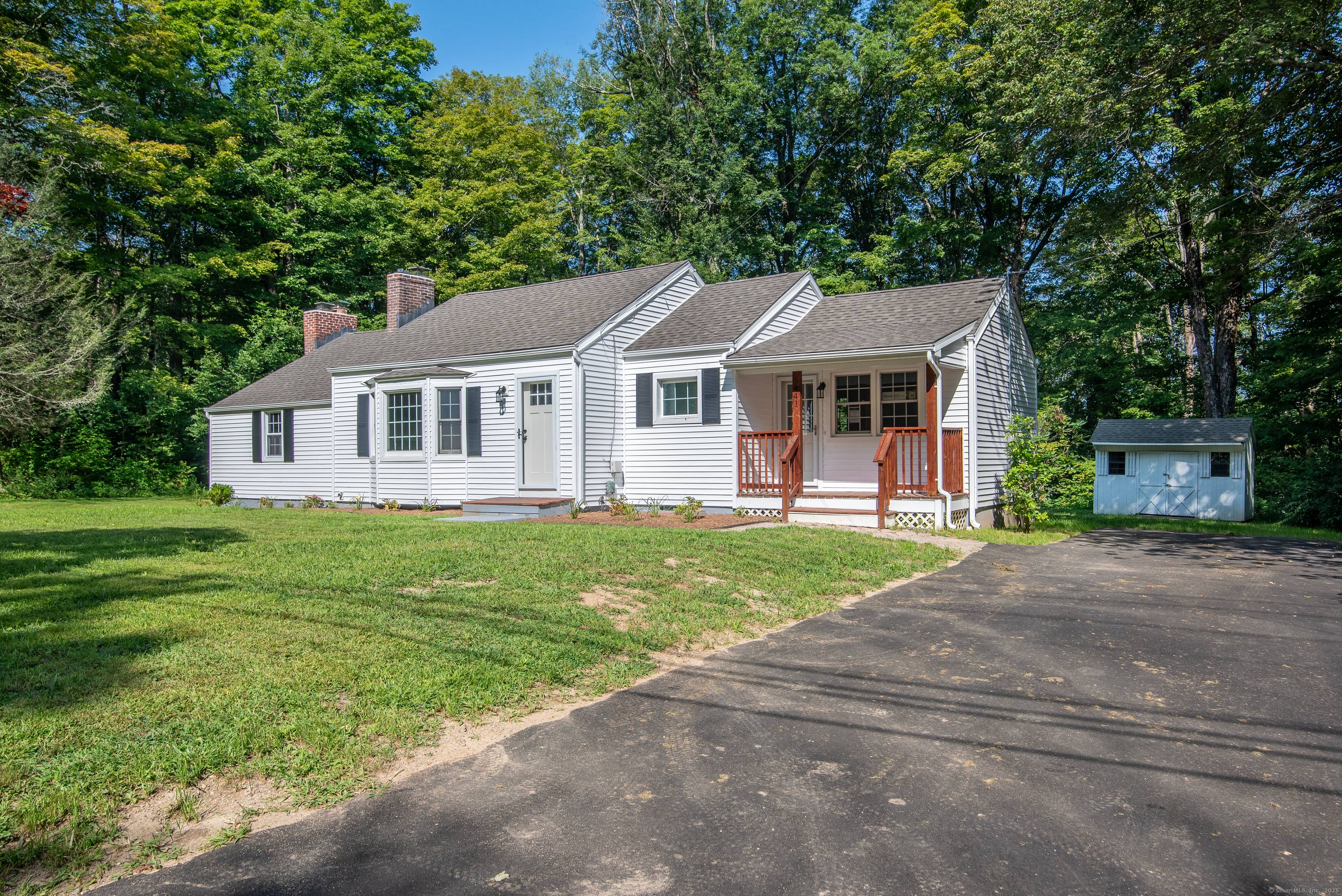 This spacious ranch style house has a new roof, new vinyl siding, some new windows and new deck plus covered front porch.