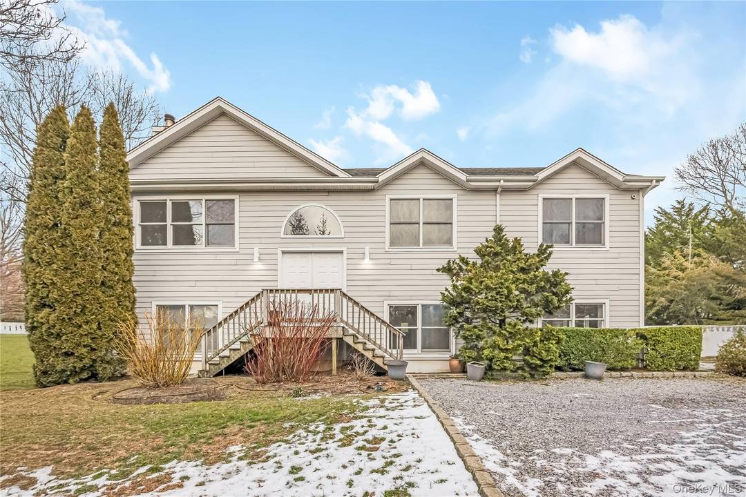 Come and see this recently refreshed, spacious Hi Ranch in Hampton Bays offering abundant room for extended family living.
