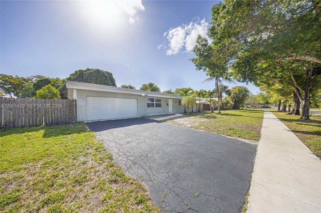 Beautifully renovated 4 bedroom, 2 bath pool home that is approximately 95 complete.