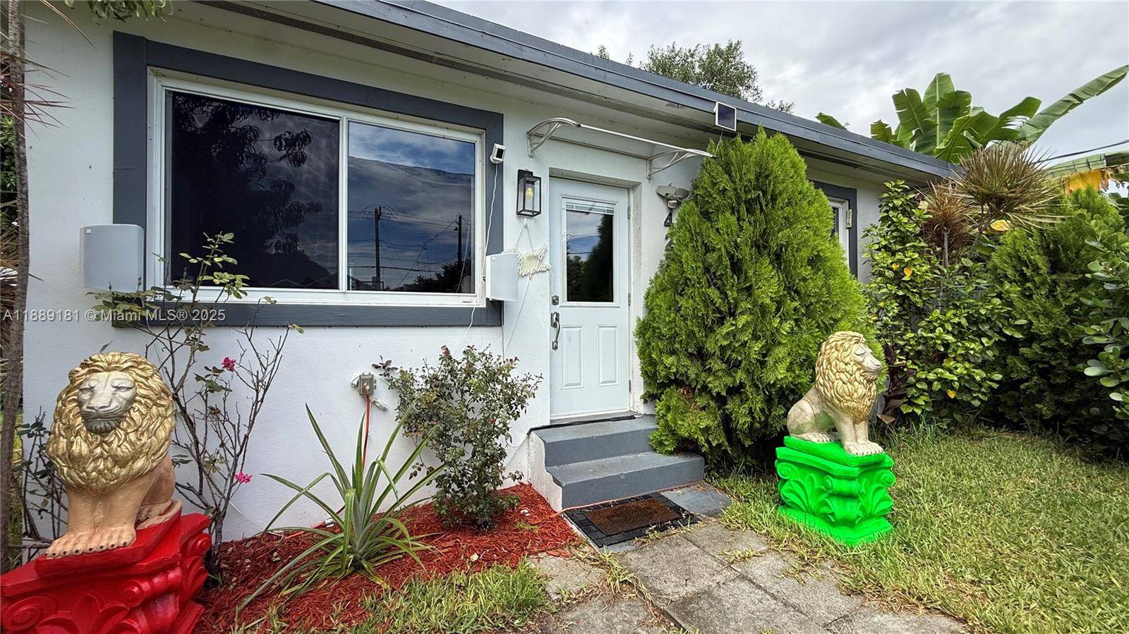 Unique Income Producing Property Beautifully remodeled single family home with duplex zoning plus two modern income producing mini homes.