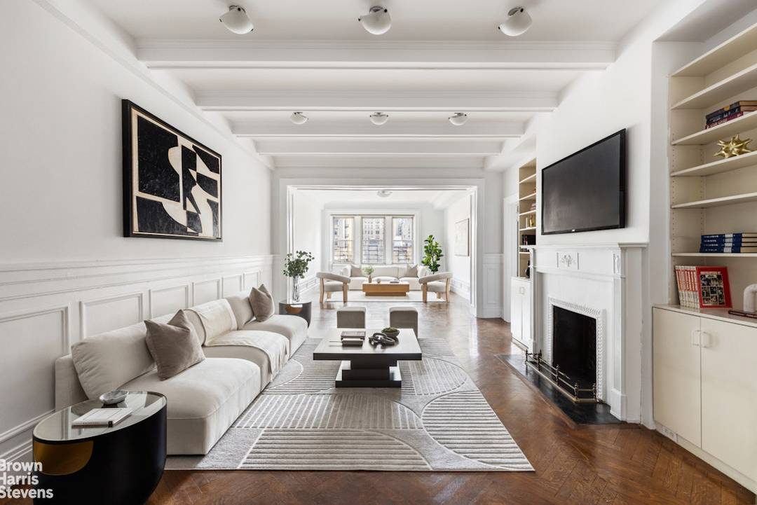 Baronial Classic 8 with the Gracious Proportions of a Bygone Era Spanning over 2, 700 sq ft, this serene prewar residence boasts four exposures and oversized, triple wide windows that ...