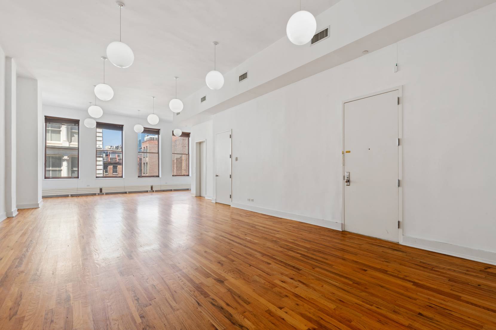 NO FEE Keyed elevator entrance Only seven full floor units Grand live work studio Prime Soho address Live and work in a massive 2, 500 square foot floor plate with ...