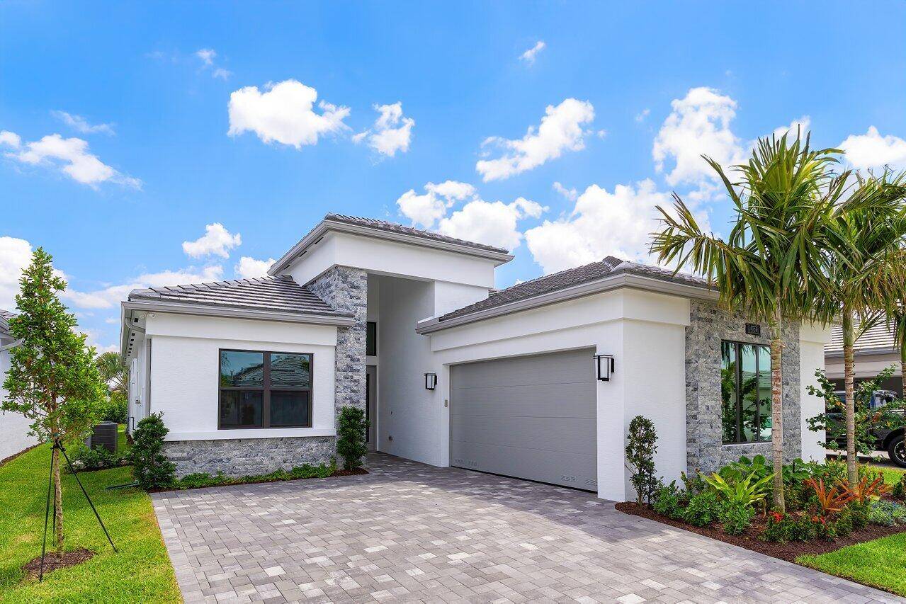 Be among the first to own this stunning, never lived in 2025 built home in the highly sought after 55 community of Valencia Grand.