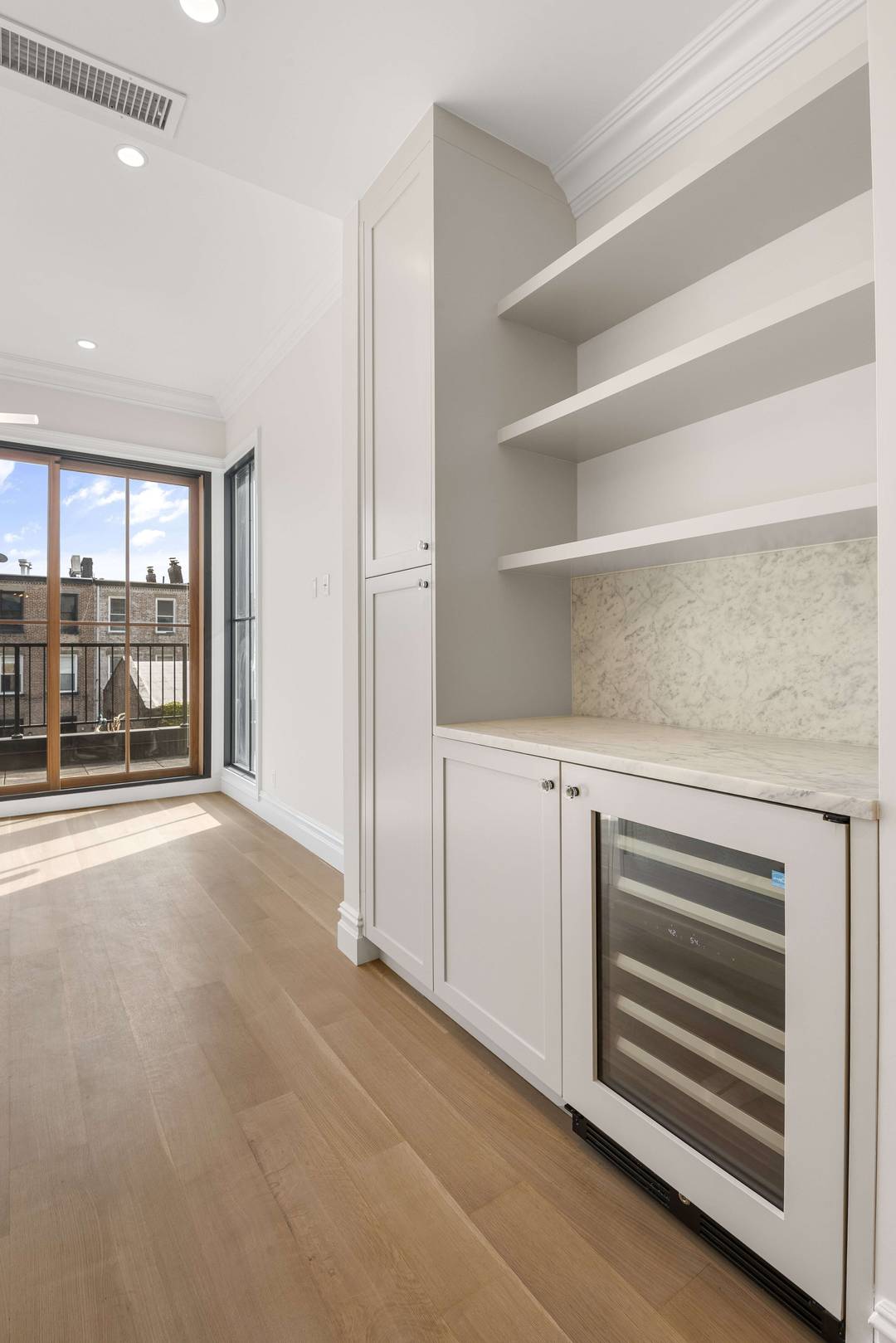 Welcome home to this stunning Carroll Gardens floor through three bedroom, two and a half bathroom residence with TWO unique private outdoor spaces, a terrace off the dining room and ...
