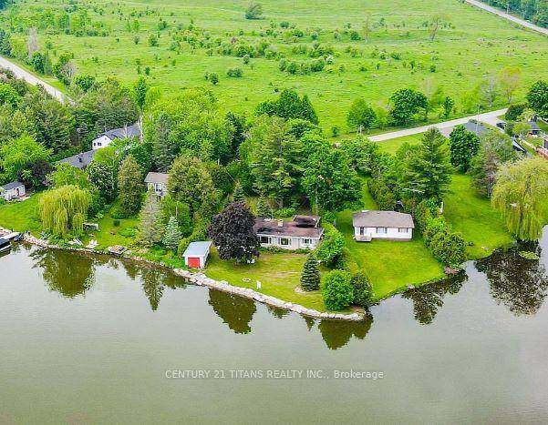 Discover your private lakefront retreat at 21 Glassford Rd a spacious, turnkey 5 bedroom, 2 bath bungalow set on a large lot with over 130 ft of Lake Scugog shoreline.