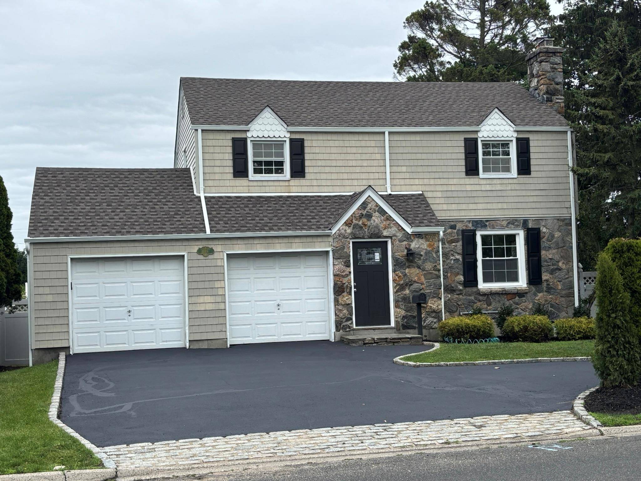 totally renovated colonial walk into this magnificent home stone fireplace in formal living room, newly done hardwood floors throughout, formal dining room, new kitchen with white shaker cabinets an quartz ...