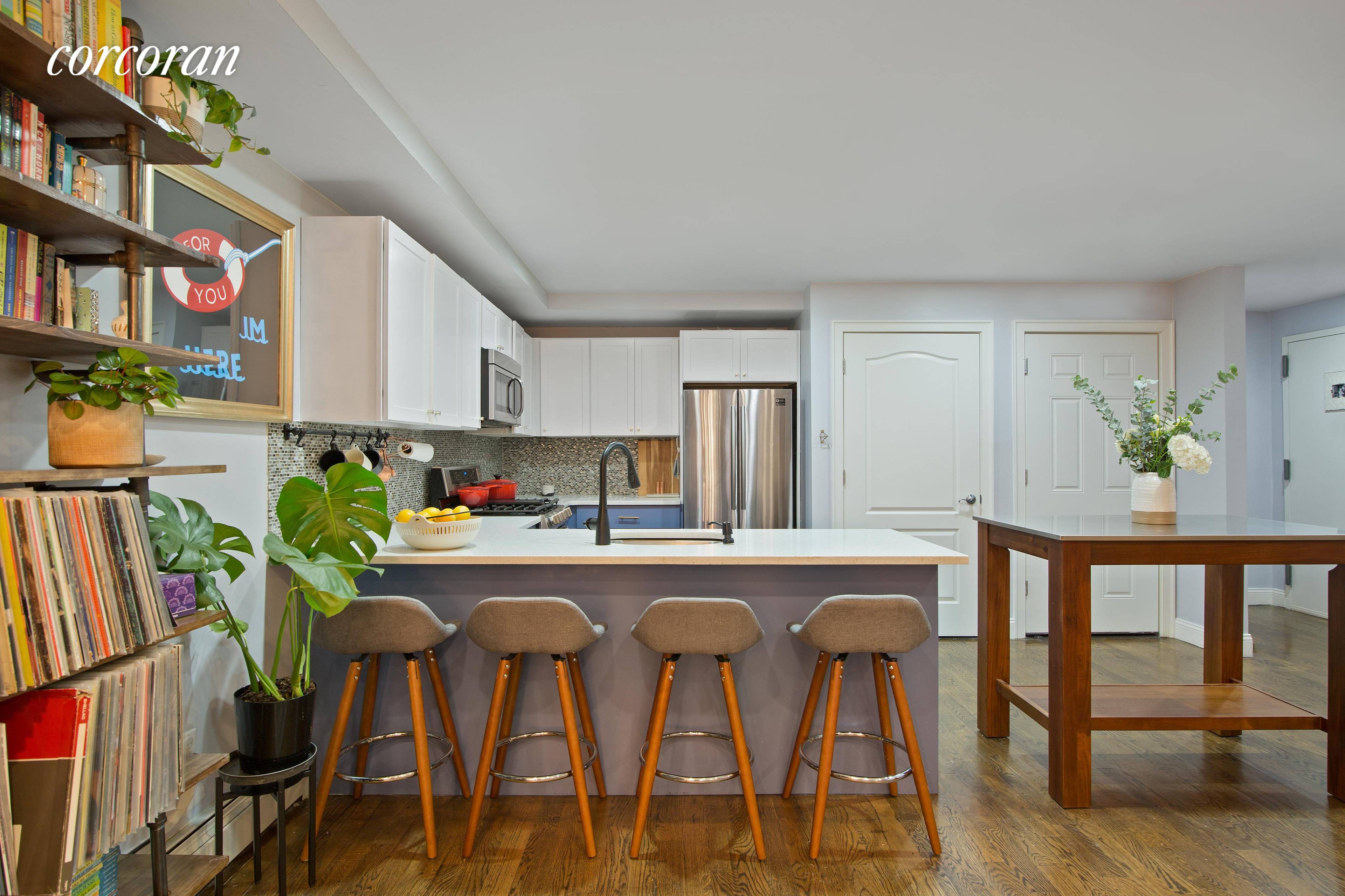 Custom elegant floor to ceiling, sliding glass doors converted this beautiful condo from a one bedroom into TWO BEDROOMS.