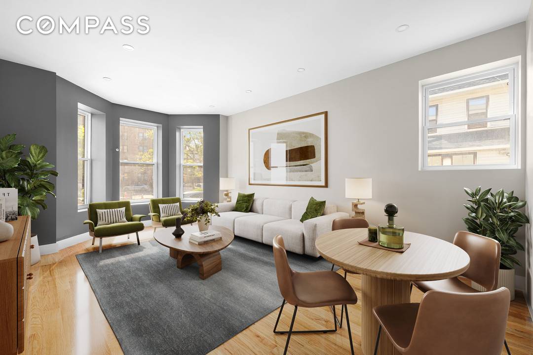 Welcome to 109 Amersfort Place, an elegant two family brick townhouse situated on a quiet, tree lined street in Flatbush.
