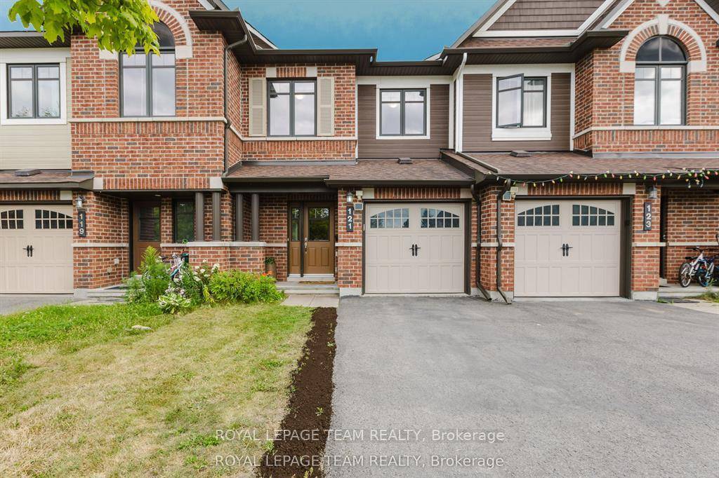 Welcome to 121 Mancini Way, a beautifully maintained 3 bedroom, 2.