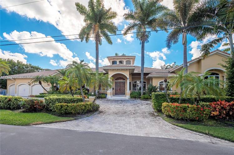 Rare opportunity to own a yacht ready waterfront estate on two oversized deep water lots with 160 feet of waterfrontage and a 140 foot private dock featuring a large boat ...