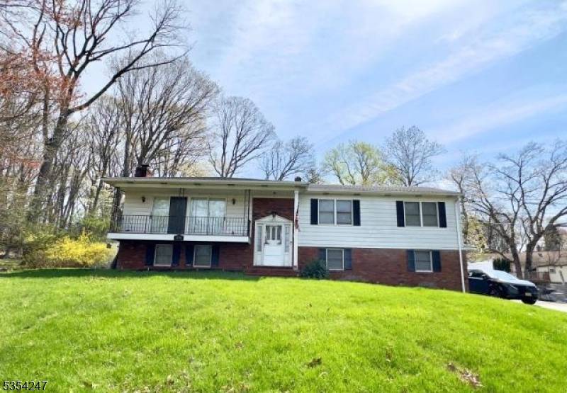 DO NOT DISTURB OCCUPANTS SOLD OCCUPIED Spacious bi level located on a quiet, tree lined street.
