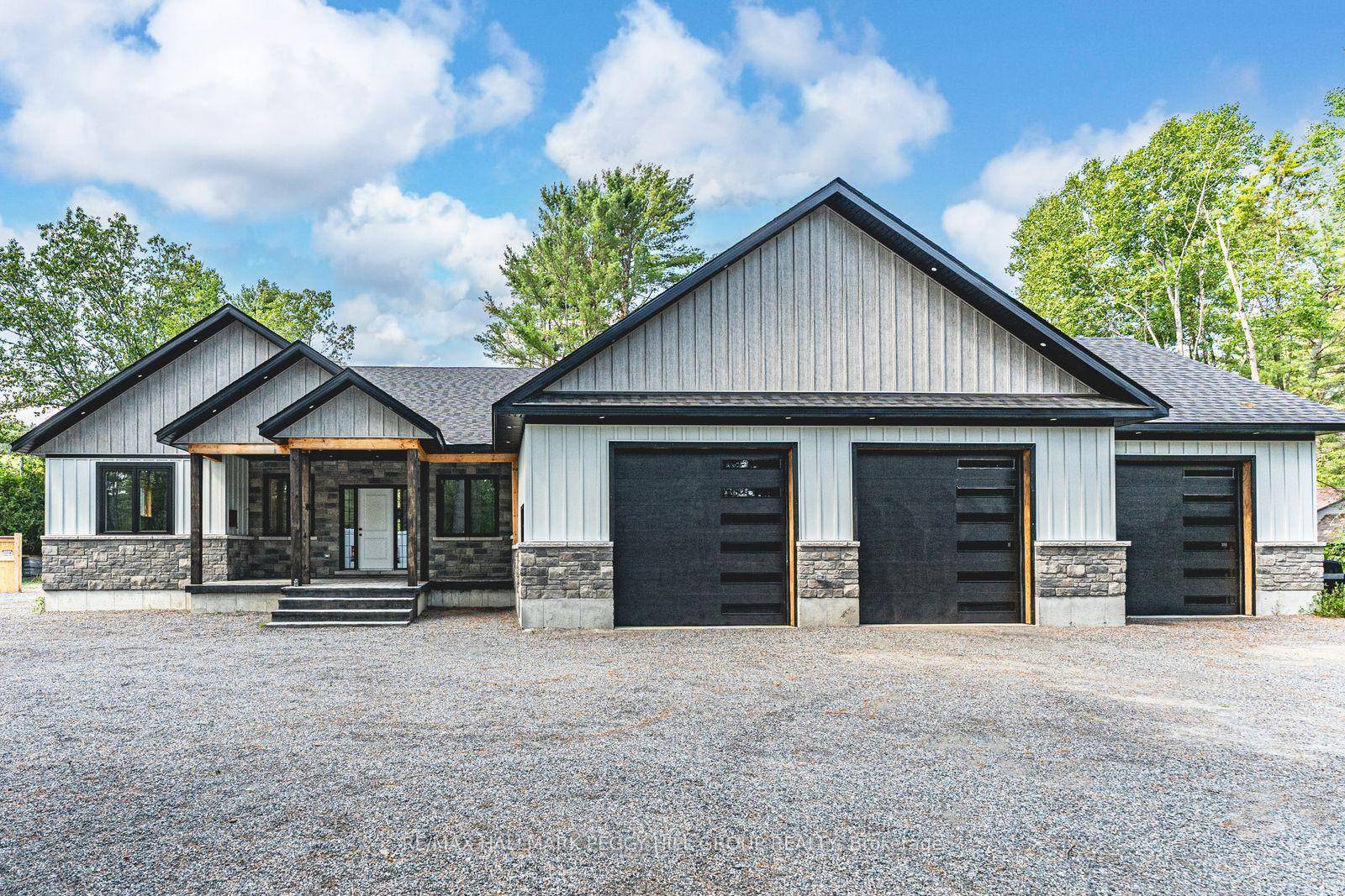 SHOWSTOPPING 2022 BUILT BUNGALOW ON A PRIVATE 1 ACRE LOT WITH A GARAGE THAT IMPRESSES !