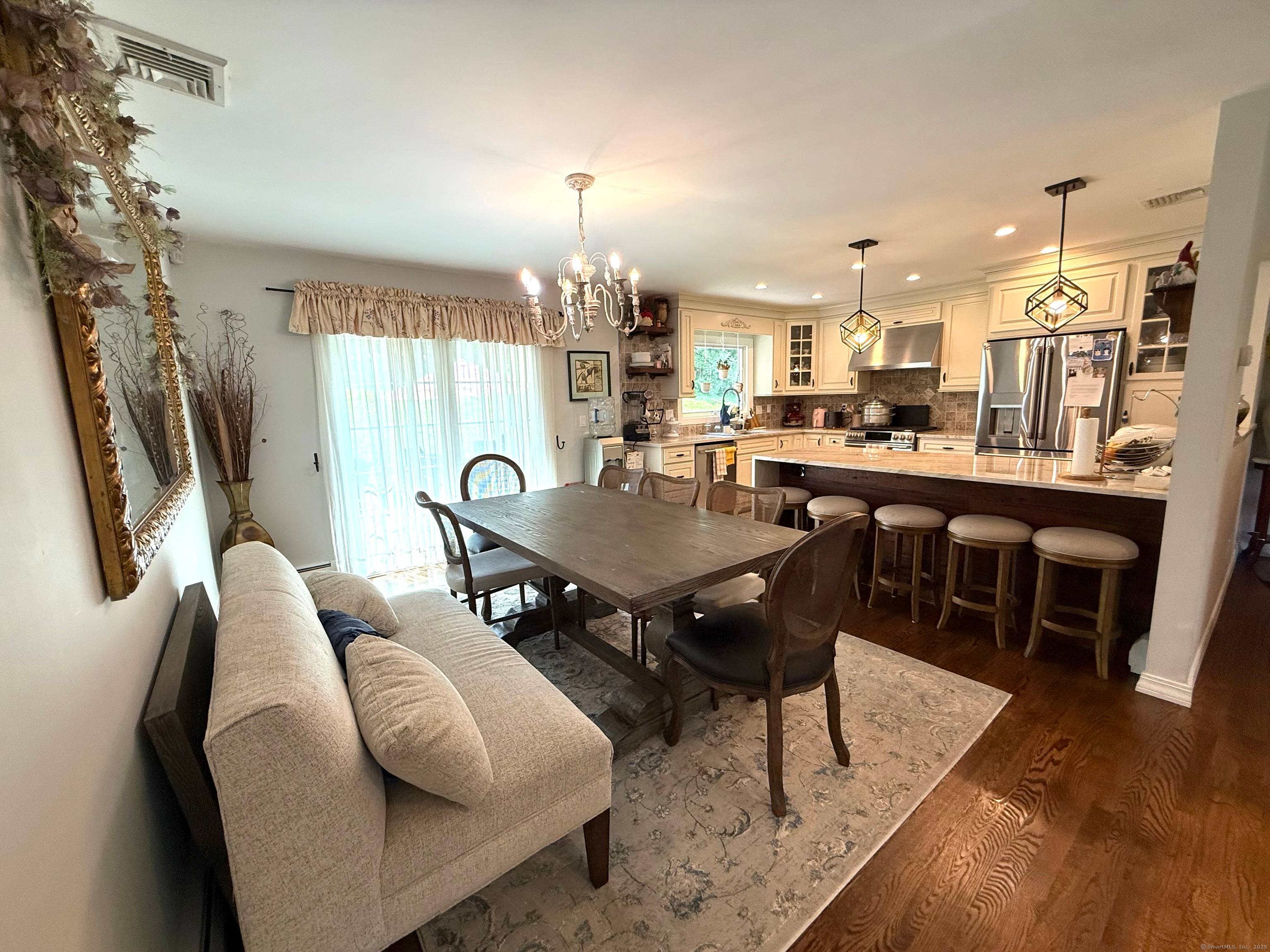 A Must see large living room with fire place open kitchen dining room 3 bed rooms all hard wood floor.