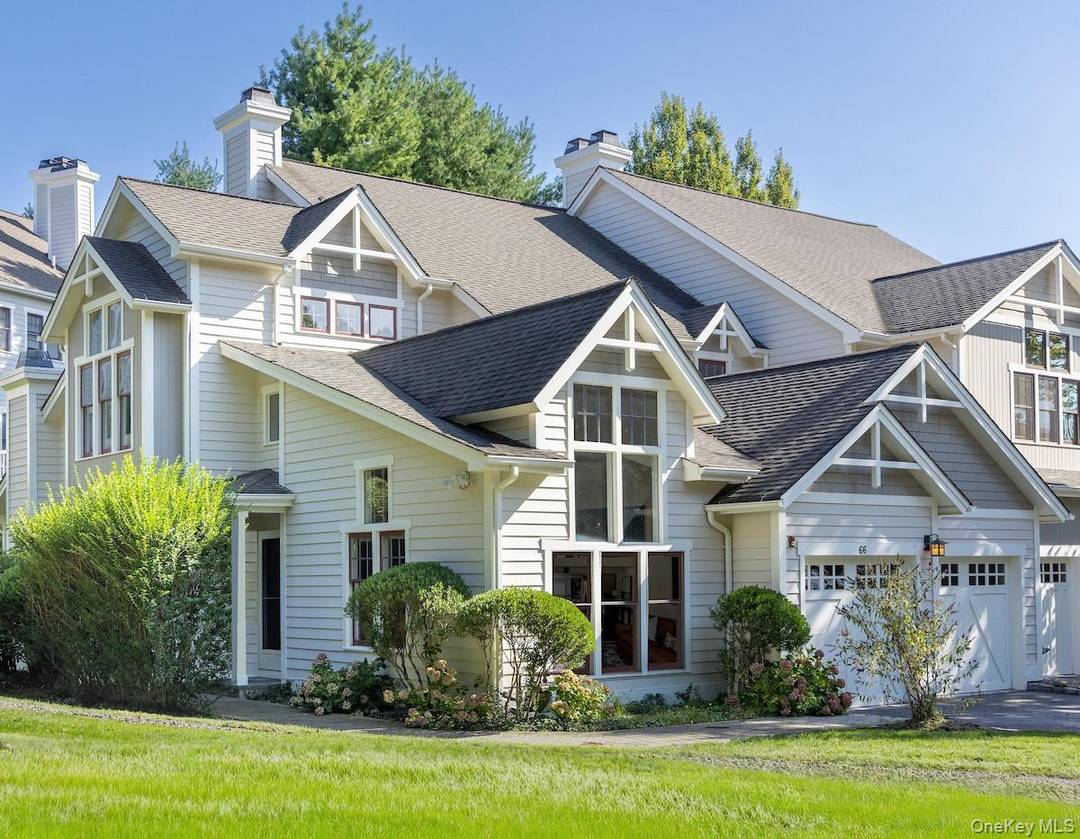 Sparkling views of the Hudson River welcome you each time you approach 66 Landing Drive, a spacious and light filled 2655 SF corner townhome with river views.