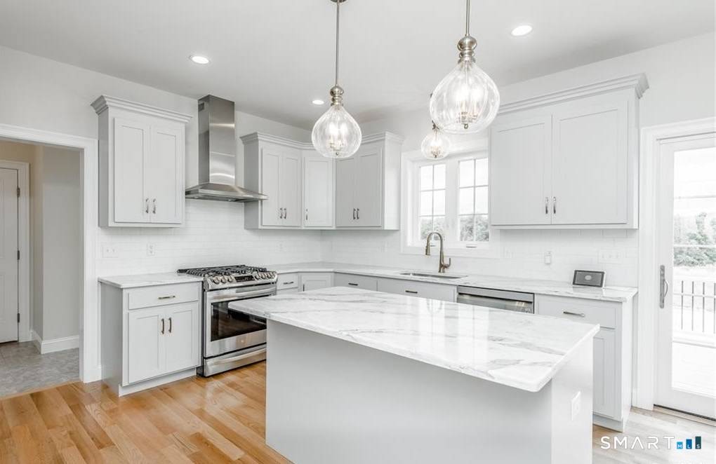 Discover your dream home in Manchester, CT, at the sought after High Ledge Circle and Rock Ridge Road.